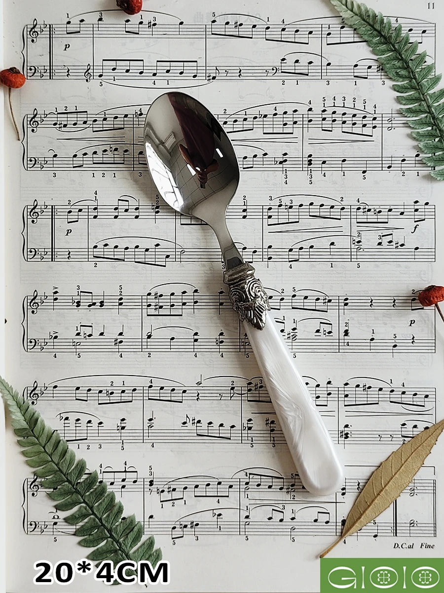 Ensemble de couverts vintage en argent