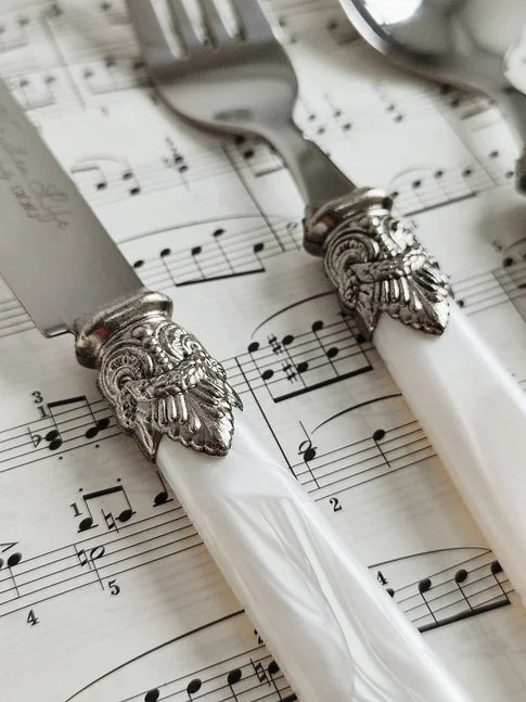 Ensemble de couverts vintage en argent