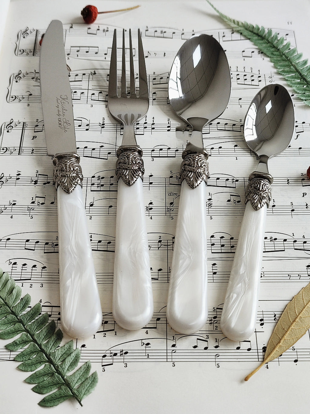 Ensemble de couverts vintage en argent