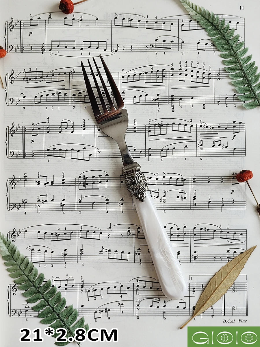Ensemble de couverts vintage en argent