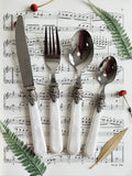 Ensemble de couverts vintage en argent