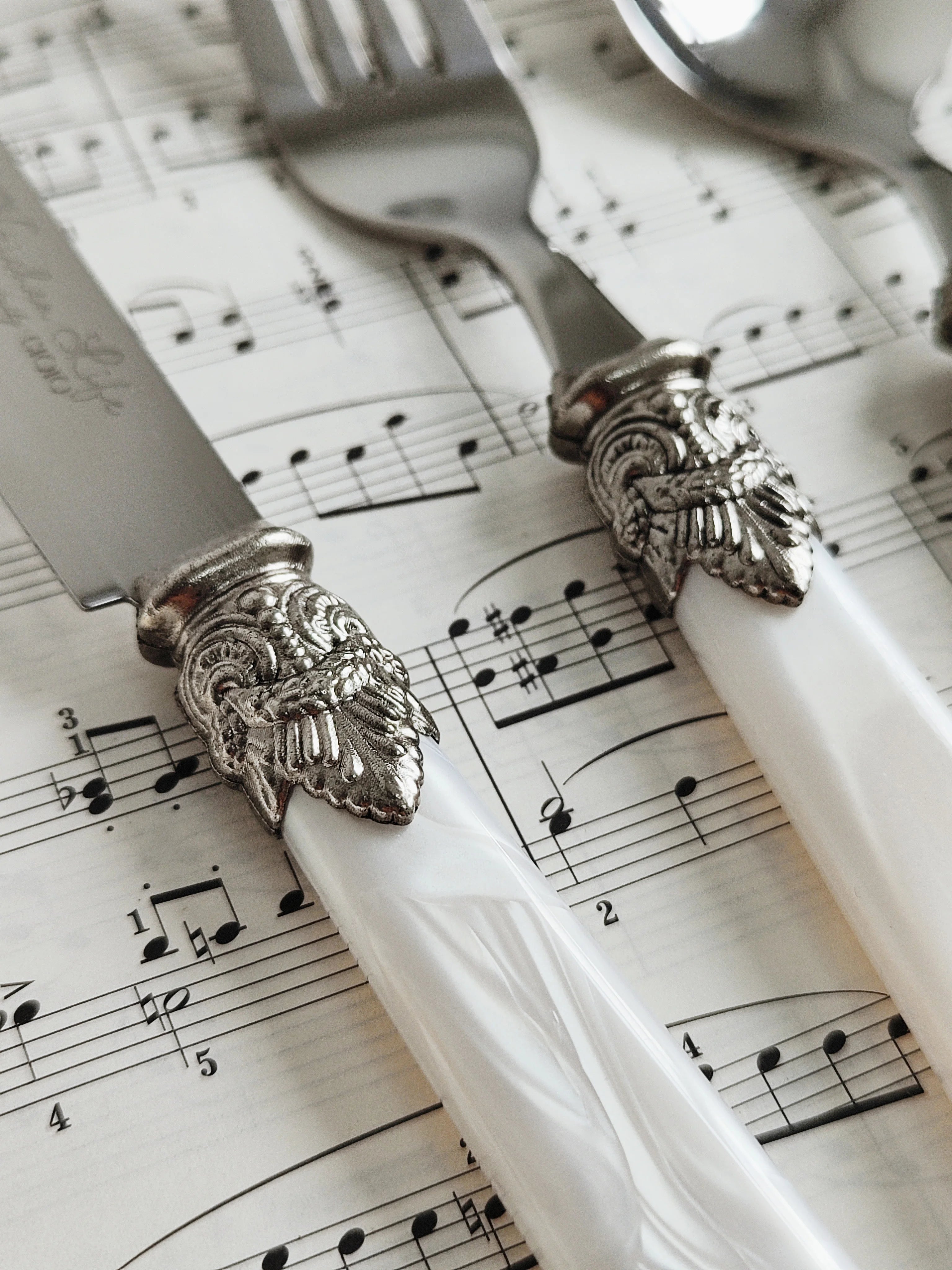 Ensemble de couverts vintage en argent